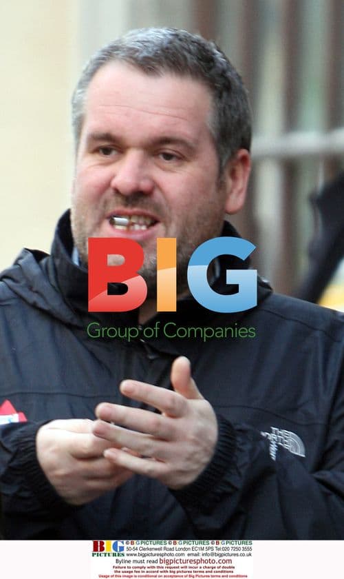 DJ Chris Moyles on a cigarette break