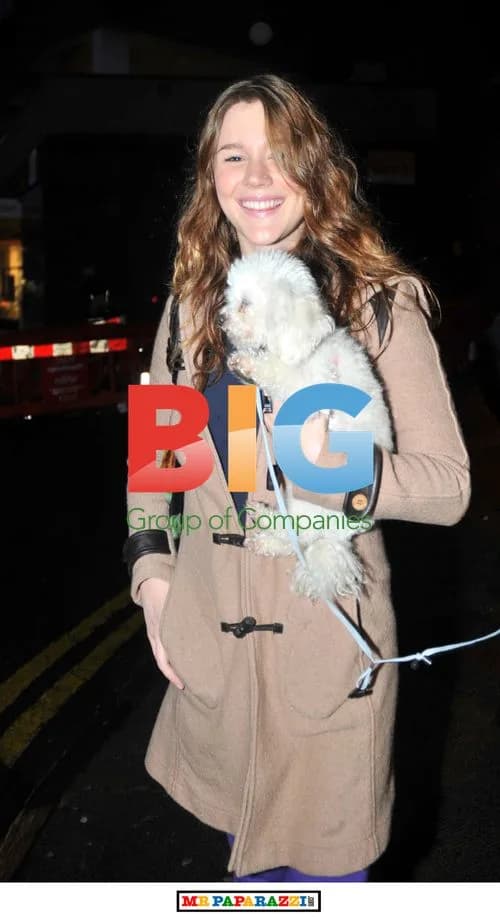 Singer Joss Stone leaving hotel with mum and dog
