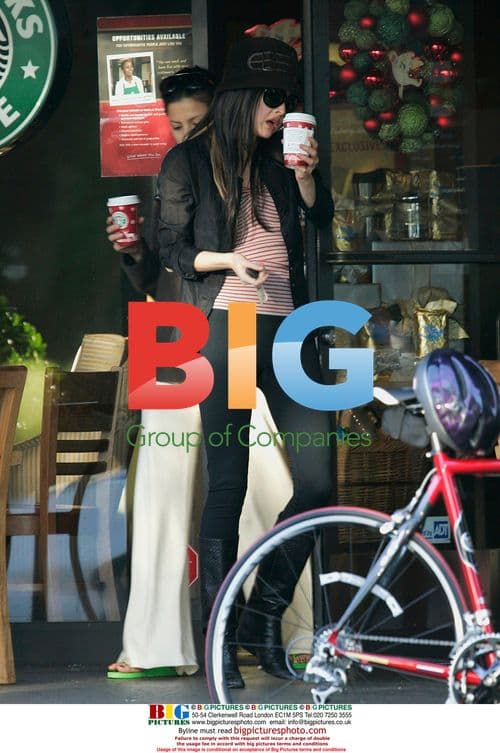 Devon Aoki leaves Starbucks in LA