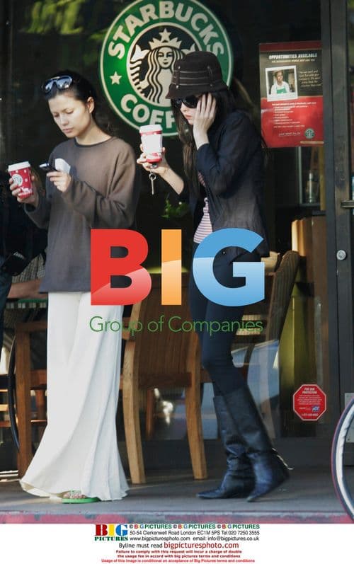 Devon Aoki leaves Starbucks in LA