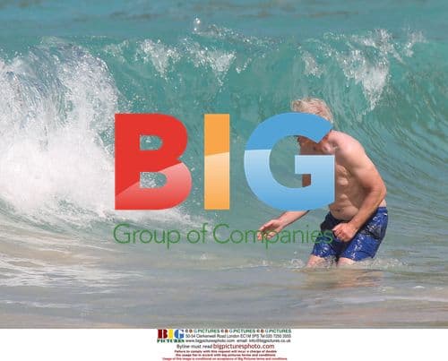 Richard Gere frolics in St Barth waves