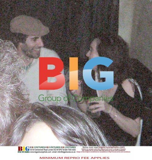 Sacha Baron Cohen kissing mystery girl