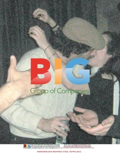 Sacha Baron Cohen kissing mystery woman