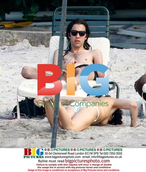 Amy Winehouse and Blake Wood on Caribbean beach