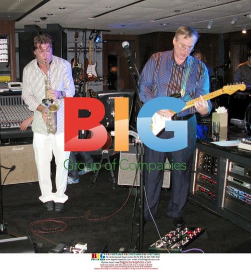 Eddie Murphy with girlfriend at Paul Allen party