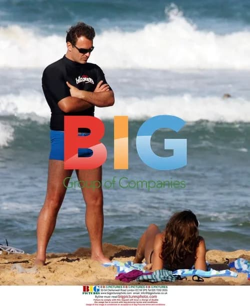Julian McMahon enjoys beach day with girlfriend