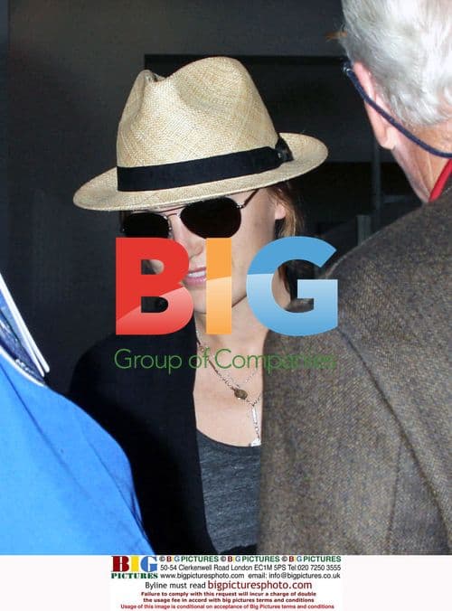 Malin Akerman departs LAX airport