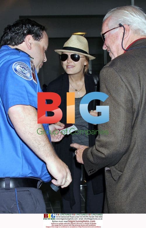 Malin Akerman departs LAX Airport