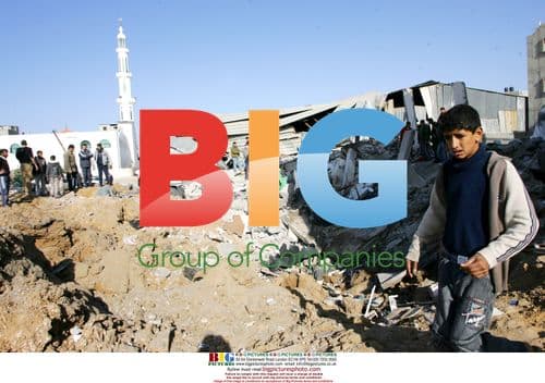 Civilians inspect rubble after Gaza air strikes