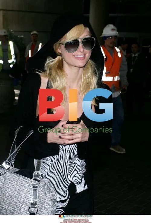 Paris Hilton and BFF Arrive at LAX