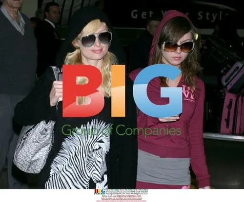 Paris Hilton and her BFF arrive at LAX