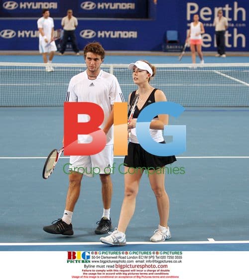 Alize Cornet and Gilles Simon play doubles