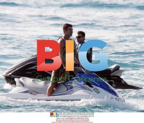 Ryan Seacrest and Simon Cowell Jetski in Caribbean