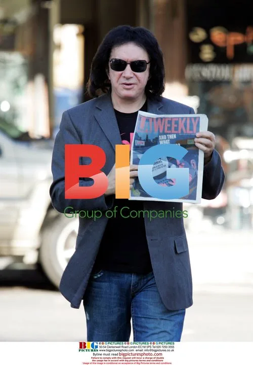 Gene Simmons reading LA Weekly newspaper