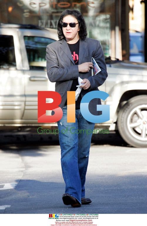 Gene Simmons reads LA Weekly newspaper