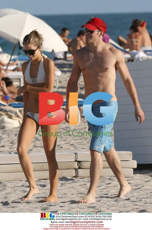 AnnaLynne McCord and Kellen Lutz frolic on Miami beach