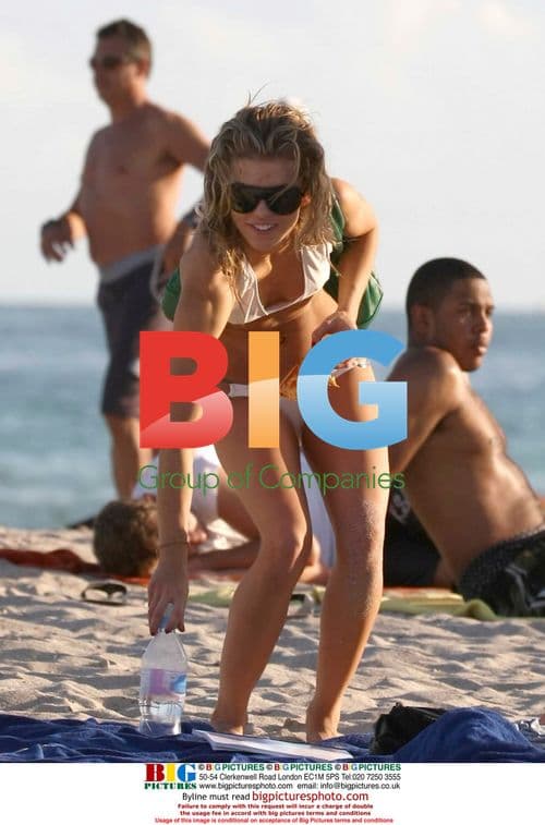 AnnaLynne McCord and Kellen Lutz frolicking on Miami Beach