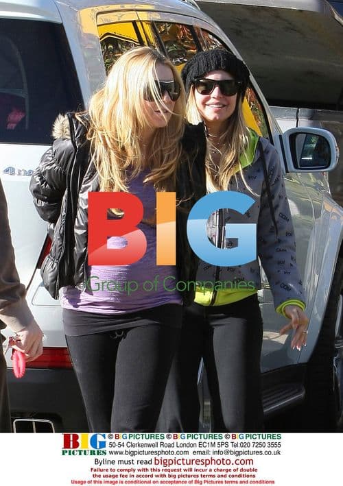 Fergie Stops for Taco Bell, Trips on Curb