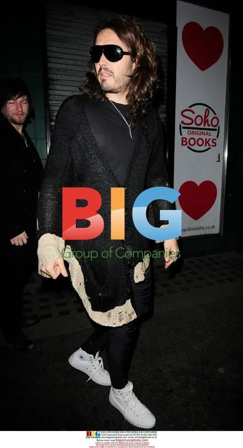 Russell Brand and Noel Gallagher seen leaving Groucho Club
