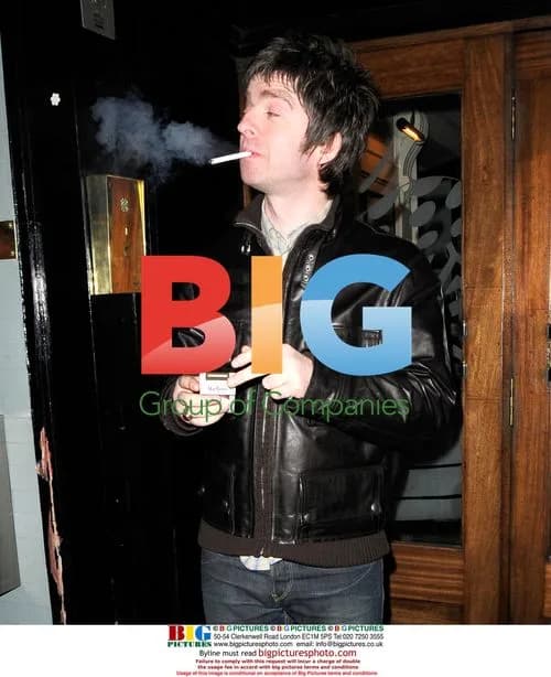 Oasis's Noel Gallagher heads outside for a cigarette