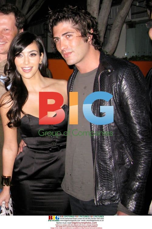 Kim Kardashian and Brandon Davis at LA Confidential Pre Golden Globe Party