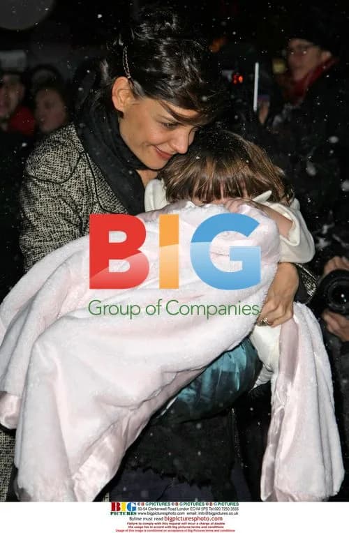 Katie Holmes and Suri Cruise return home in snow