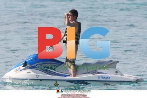 Simon Cowell Jet Skiing with $50K Watch