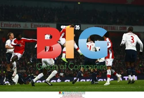 Nicklas Bendtner heads the ball for Arsenal