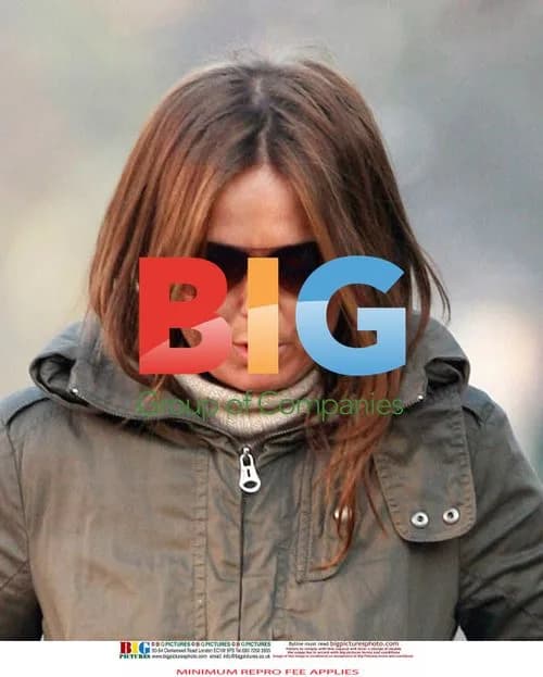 Geri Halliwell walks dog in park