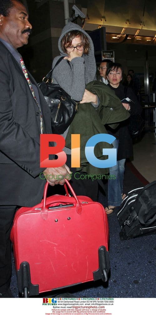 Maggie Gyllenhaal Departs LAX