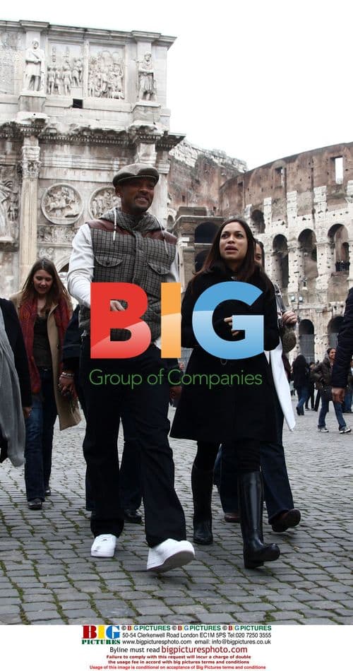 Will Smith and Rosario Dawson visit Rome's Colosseum