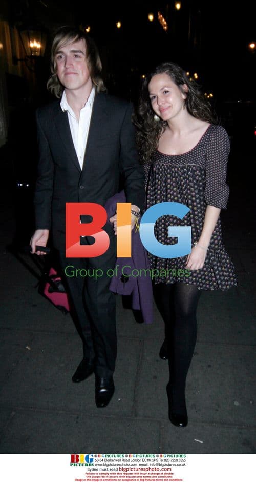 Tom Fletcher and female friend leaving party