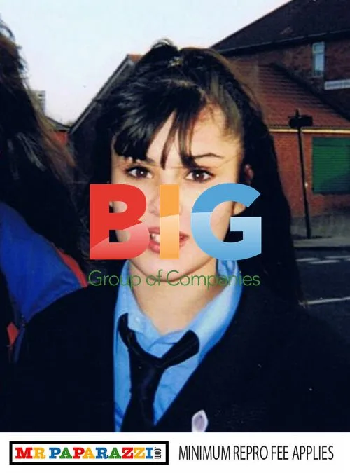 Cheryl Tweedy Cole Poses with Classmate