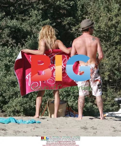 Pamela Anderson Chills in Bikini with Boyfriend