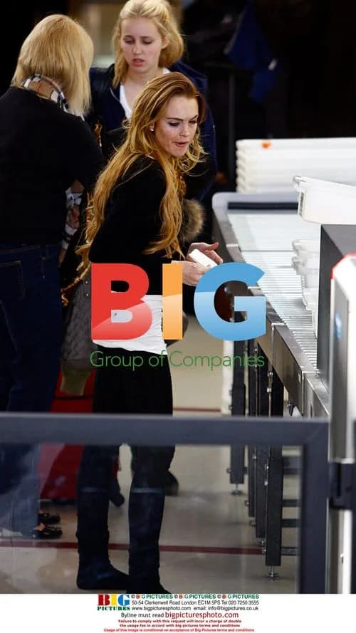 Lindsay Lohan going through airport security