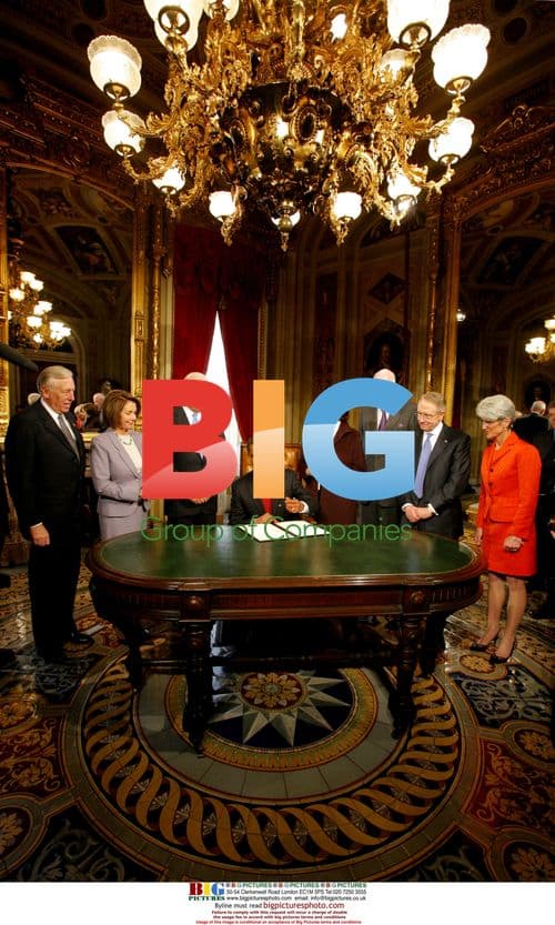 President Obama signs first act as President