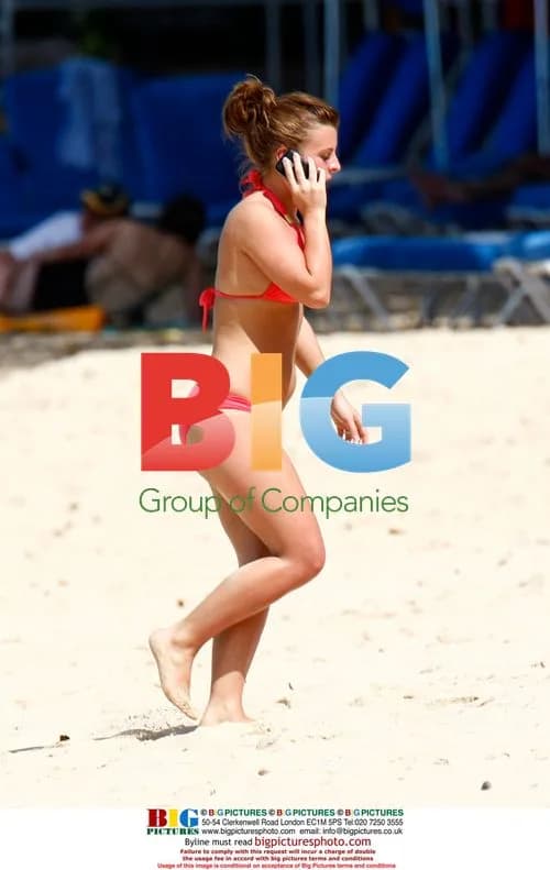 Coleen Rooney on Caribbean beach