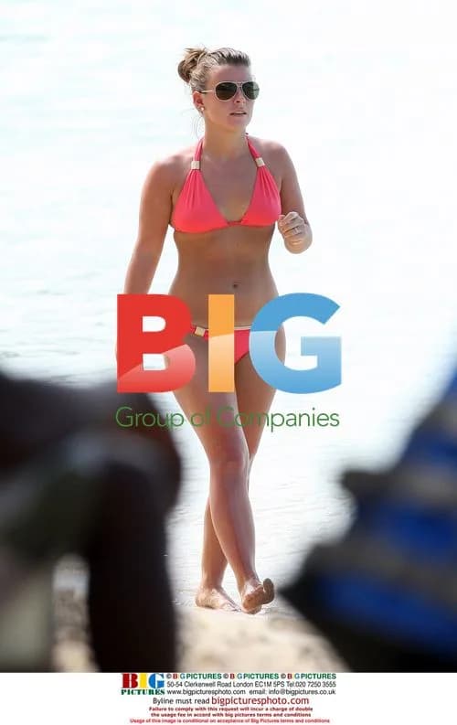 Coleen Rooney on Caribbean beach