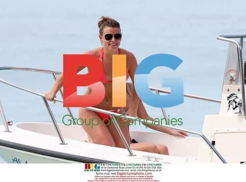 Coleen Rooney on Caribbean beach