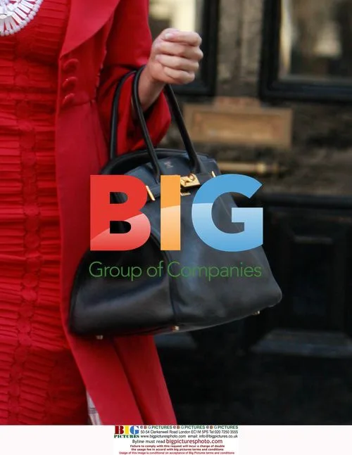 Kelly Brook steps out in bright red outfit
