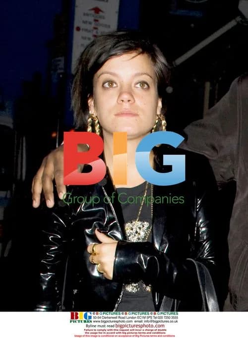 Lily Allen shops on Portabello Rd, London
