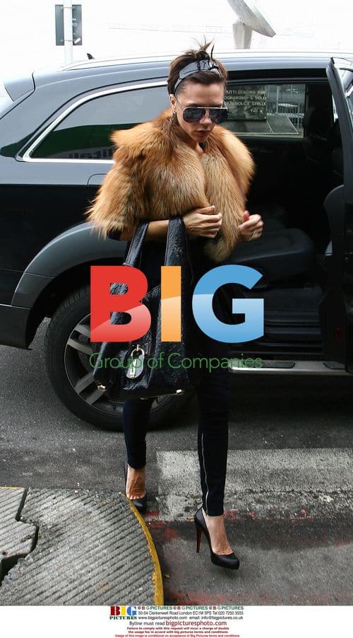Victoria Beckham Arrives at Milan Airport