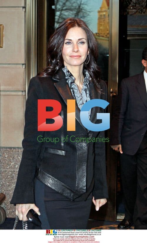 Courteney Cox Arquette Leaving Ritz-Carlton Hotel