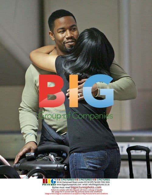 Michael Jai White with family at LAX