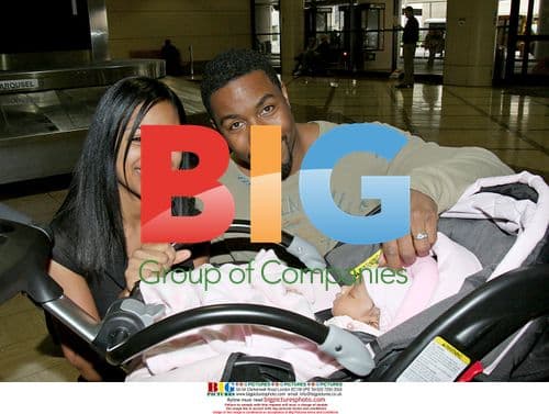 Michael Jai White arrives at LAX with family