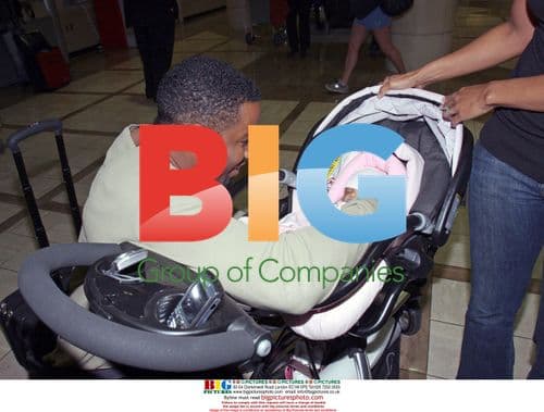Michael Jai White with family at LAX