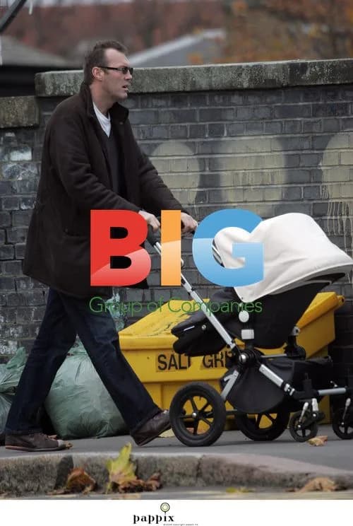 Andrew Morton takes baby for walk in London