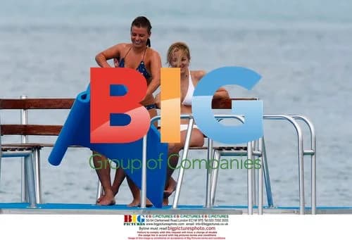 Coleen Rooney Swims in Caribbean
