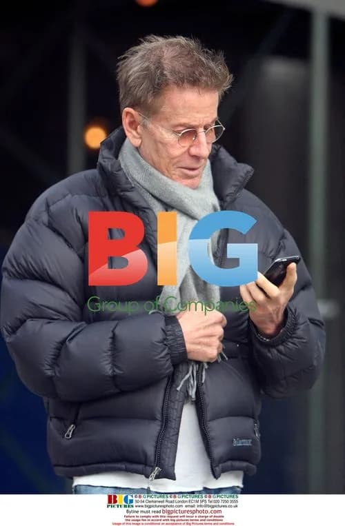 Calvin Klein on phone in New York