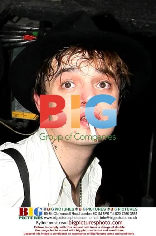 Pete Doherty with new friend at gig